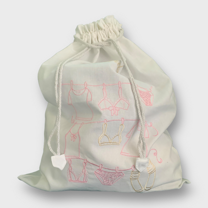 Delikat skittentøypose lage av overskuddsmaterialer i lin og bomull