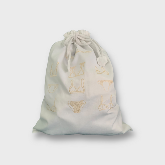 Delikat pakkepose med broderier