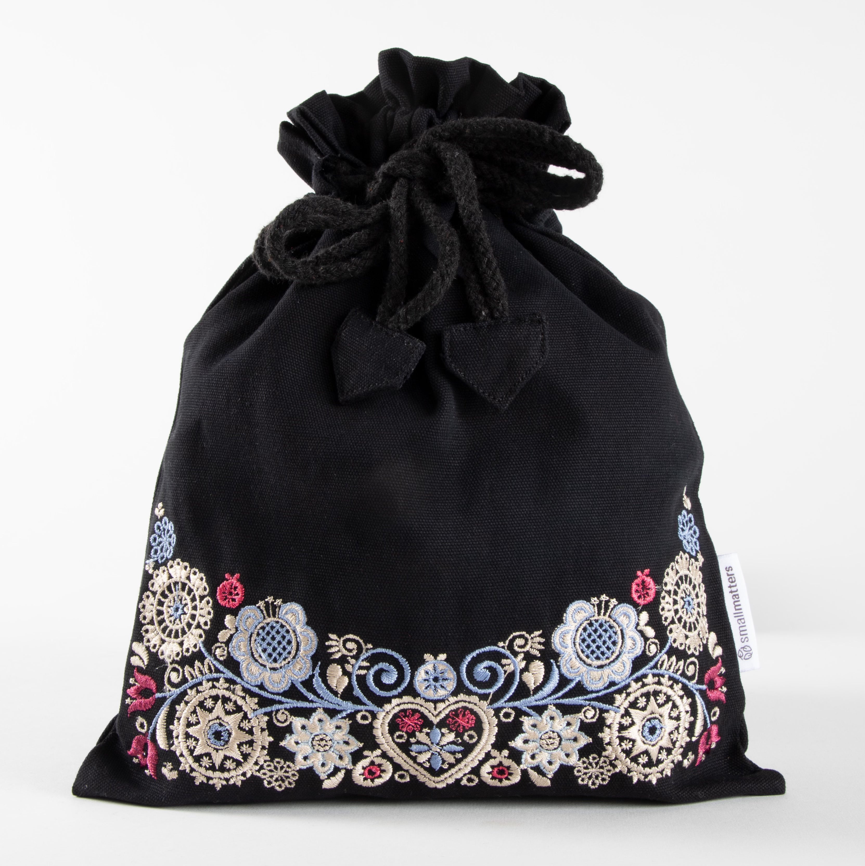 Oppbevaringspose svart - sand/pastell